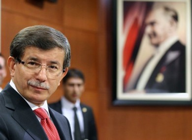 Turkish Foreign Minister Ahmet Davutoglu speaks to the media in Ankara, Turkey.