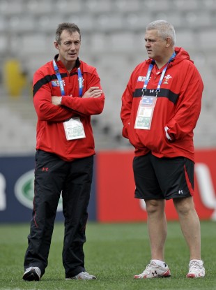 Rob Howley (left) will replace Warren Gatland (right) for Wales' tour of Australia.