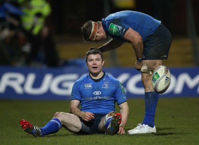 O'Driscoll receives the congratulations of Jamie Heaslip after scoring.