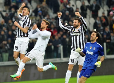 Juve players celebrate after full time.