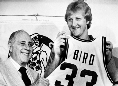 Baller: Larry Bird, with Celtics president Red Auerbach, signs on with Boston in 1979.