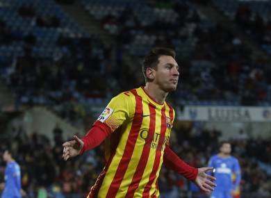 Messi celebrates scoring for Barcelona during the week.