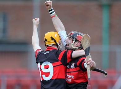 Mount Leinster's Hugh Patrick O'Byrne and Gary Kelly celebrate at the final whistle.
