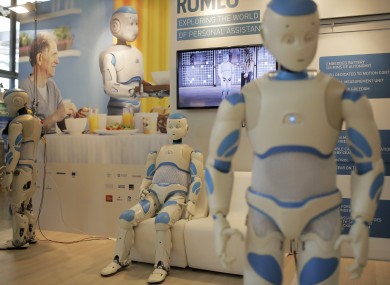 Romeo, humanoid robots from Aldebaran, are seen during the Innorobo European summit/