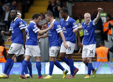 Everton's Steven Naismith (right) celebrates after scoring his side's third goal.
